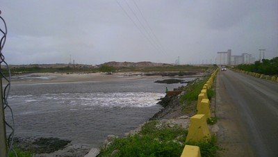 Access dam blocking the free flow of water in and out of the Tatuoca estuary
